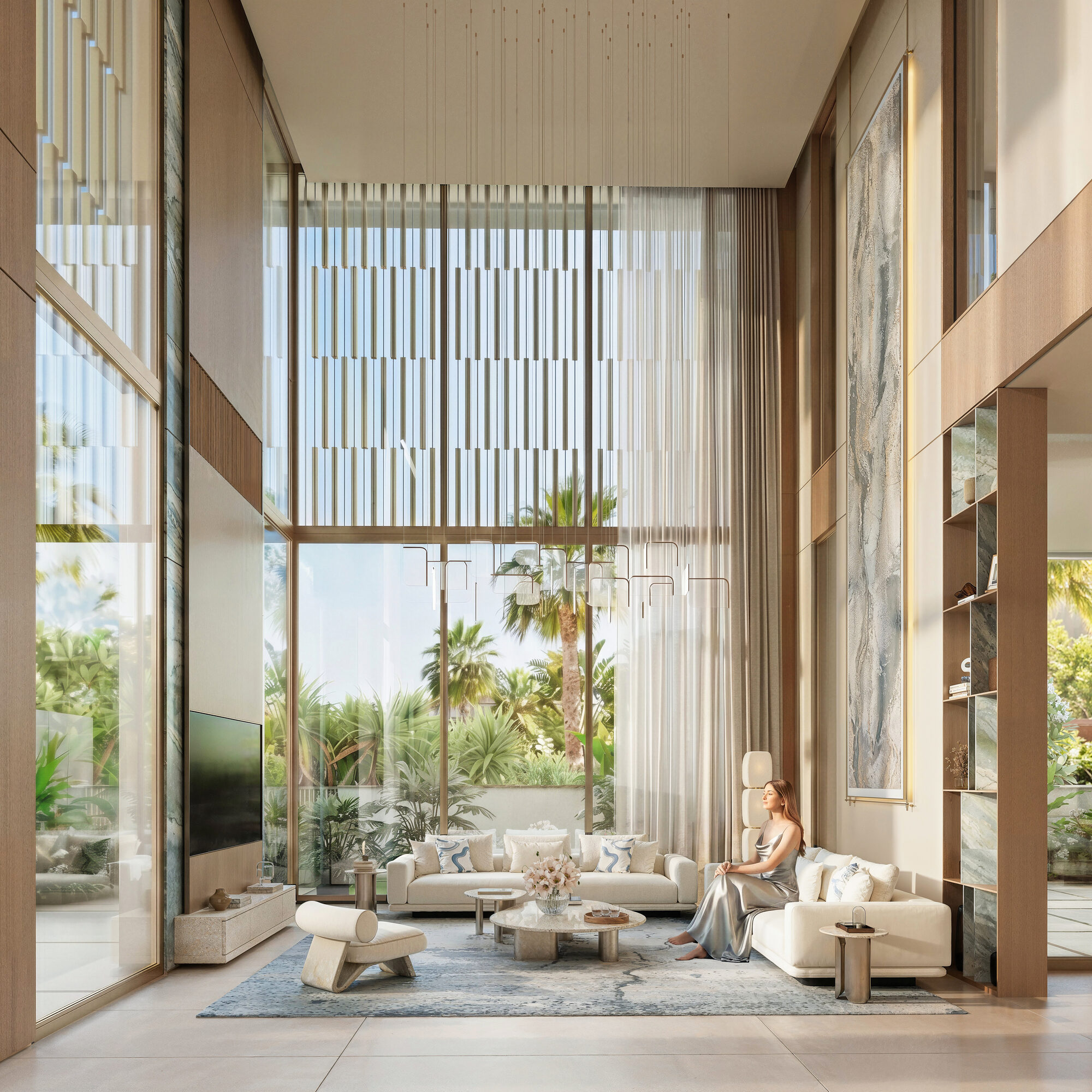 Tilal Binghatti Mansion interior — double-height living area with travertine floors and oak veneer